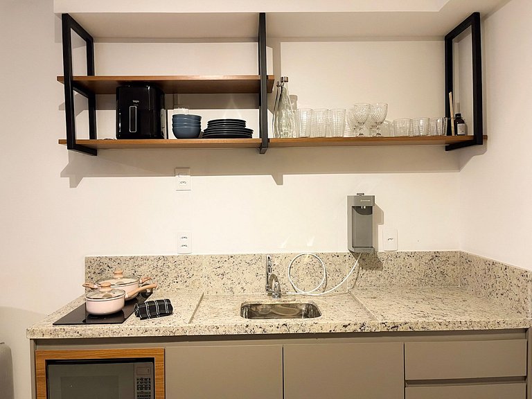 Estúdio com piscina no coração da cidade