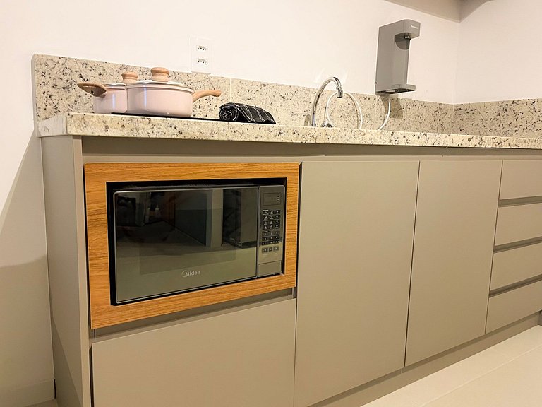 Estúdio com piscina no coração da cidade