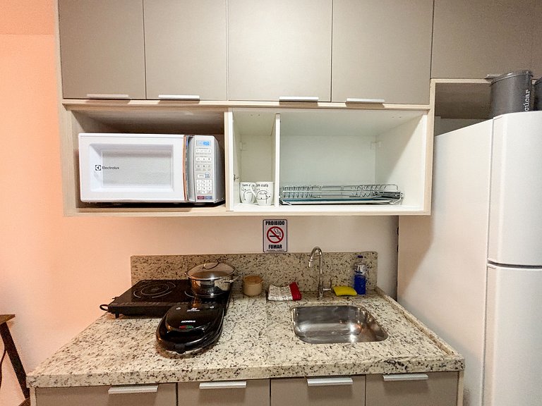 Estúdio com varanda no centro, piscina aquecida