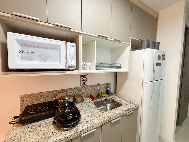 Estúdio com varanda no centro, piscina aquecida